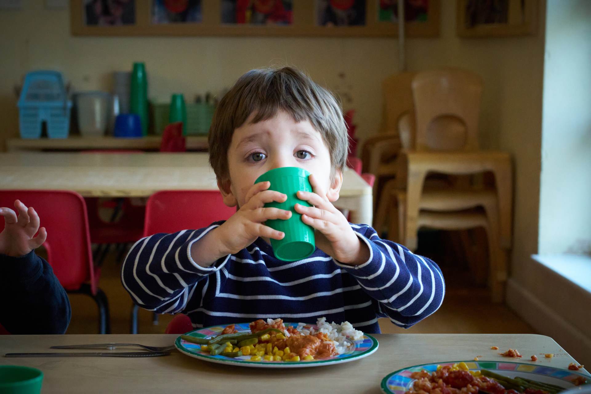 Toddler eating lunch